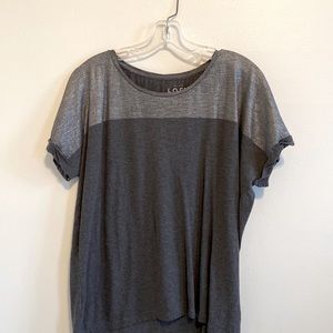 Two tone gray shirt sleeve knit top.